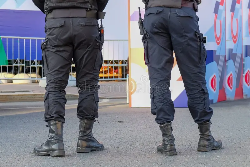 security city guards outfit controlling entrance policemen trousers boots modern design back view police officers 178422332
