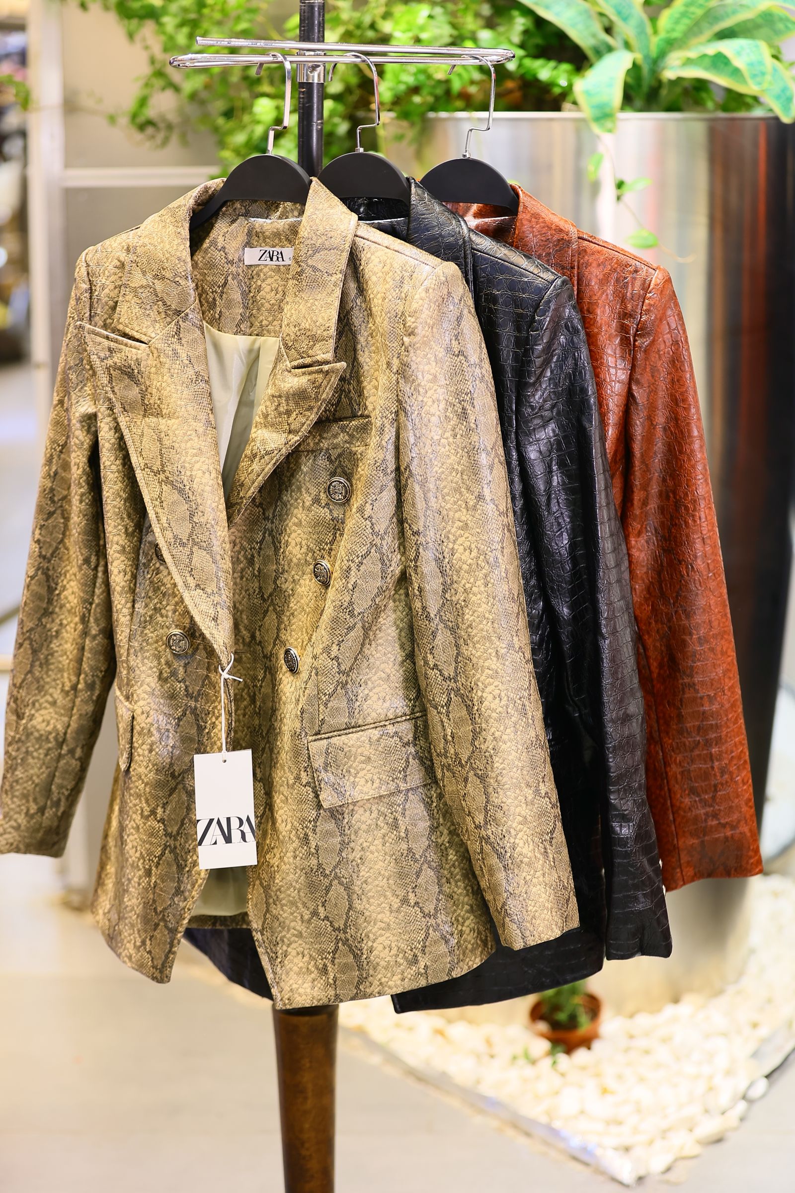 Corporate Blazer 1 Blazers hanging on a rack