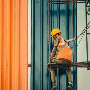 Construction worker in hard hat and safety workwear