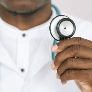 Doctor in a white lab coat with stethoscope