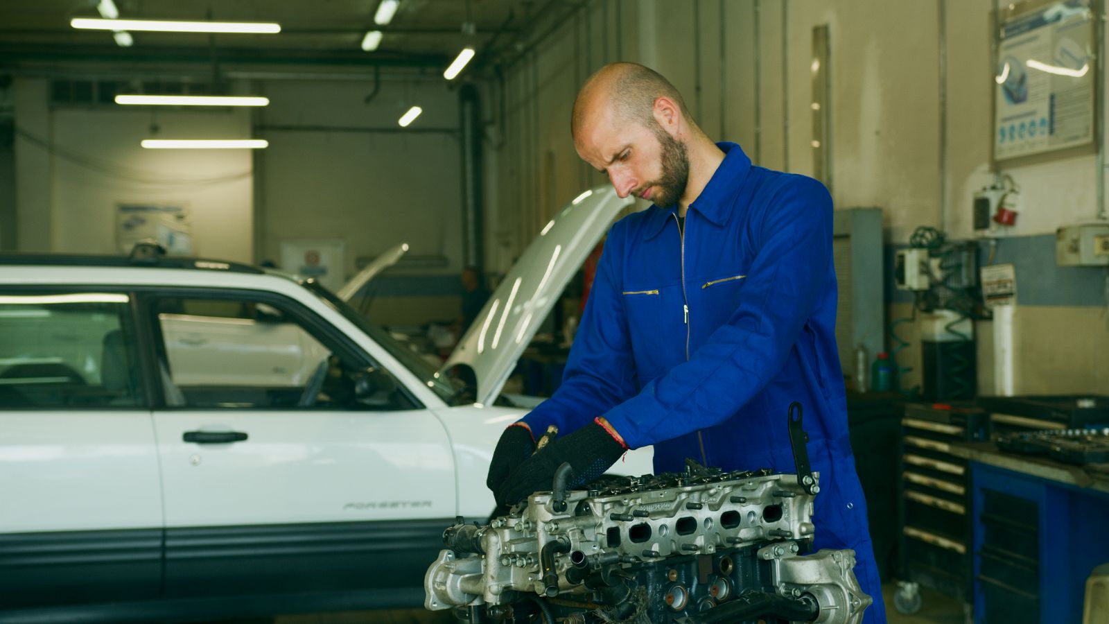 Industrial Coverall 1 Mechanic wearing a blue coverall uniform